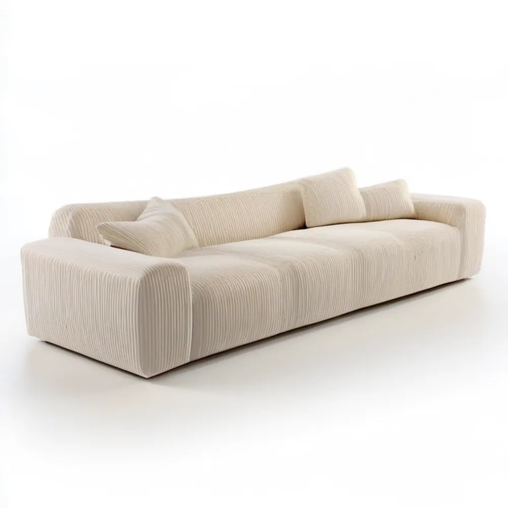 Kremowa sofa trzyosobowa ze sztruksową tapicerką i poduszkami 230 x 100 x 72 cm