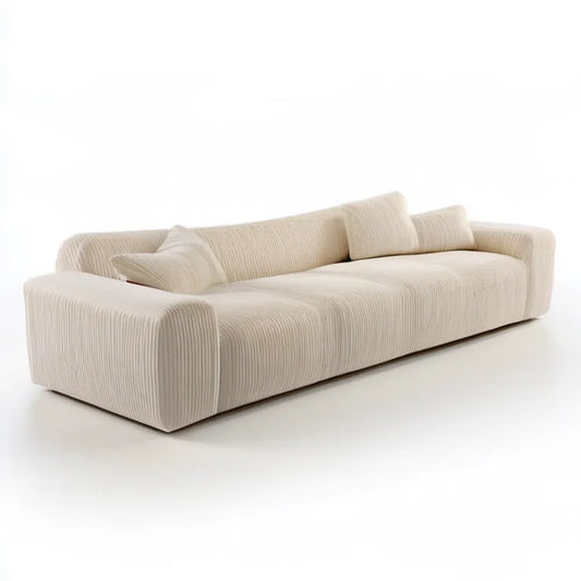 Kremowa sofa trzyosobowa ze sztruksową tapicerką i poduszkami 230 x 100 x 72 cm